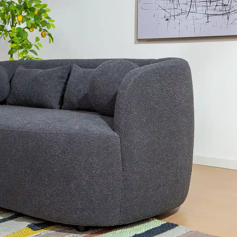 Causeuse 2 places en tissu bouclé avec oreillers