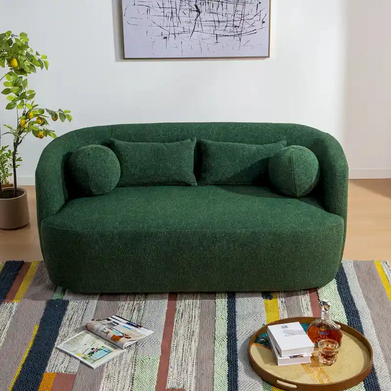 Causeuse 2 places en tissu bouclé avec oreillers