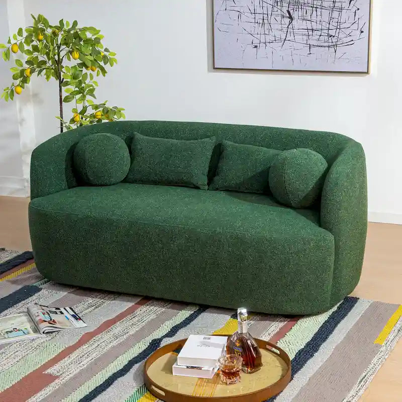 Causeuse 2 places en tissu bouclé avec oreillers