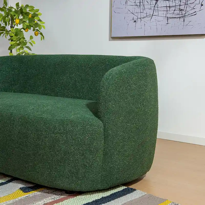 Causeuse 2 places en tissu bouclé avec oreillers