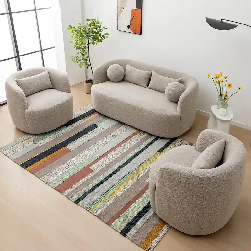Causeuse 2 places en tissu bouclé avec oreillers